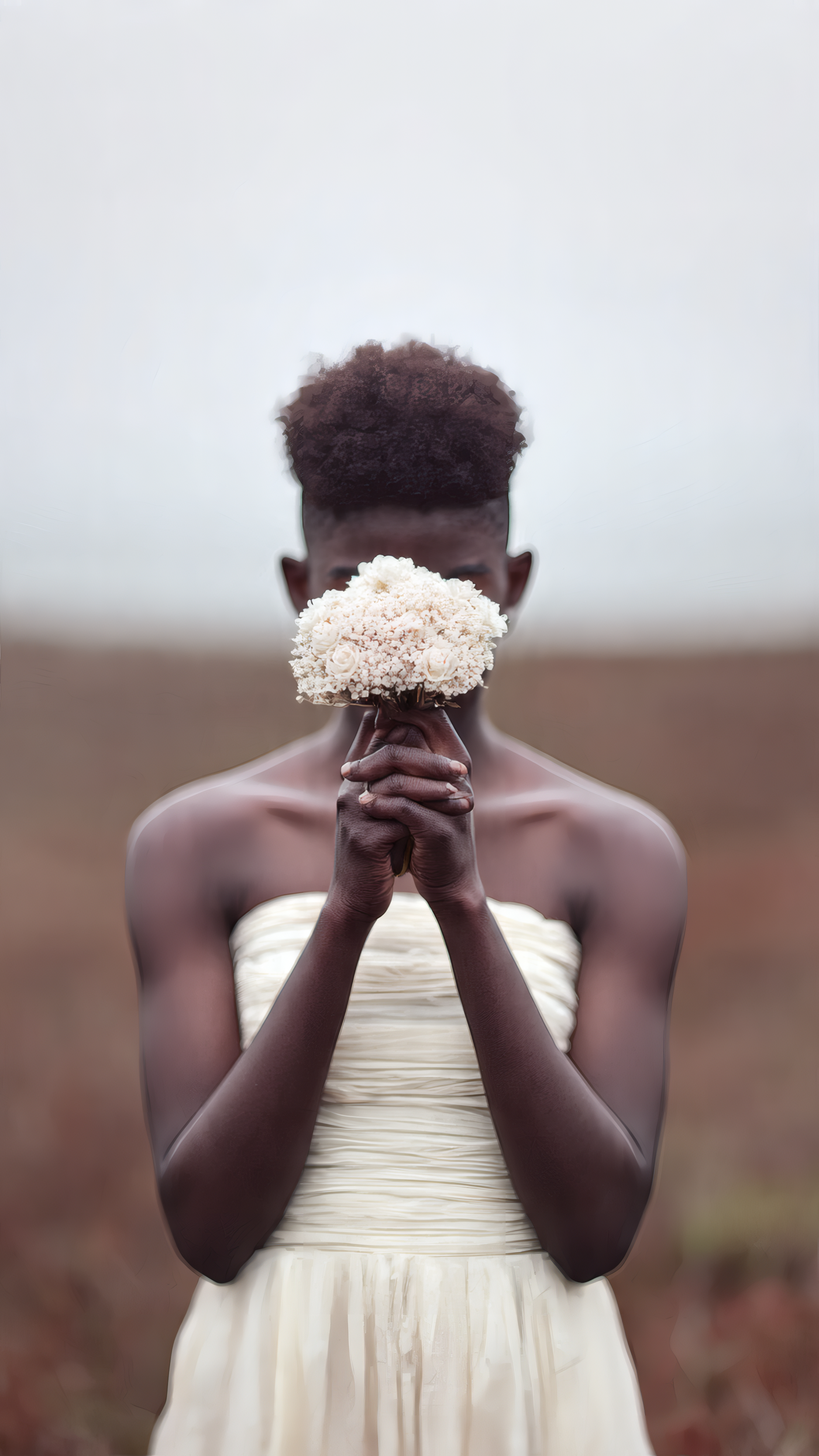 Woman in Dress Holding Flowers