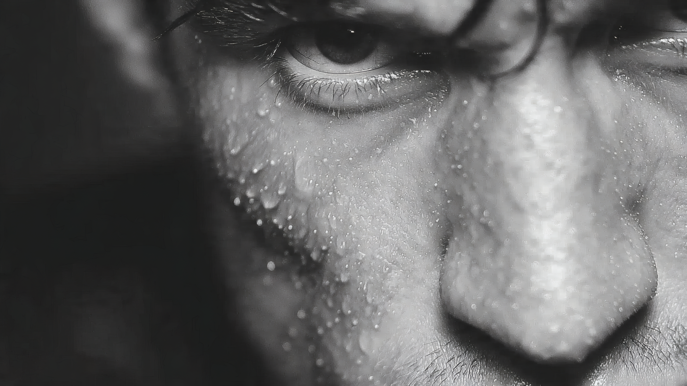Monochrome Close up of Sweaty Human Face