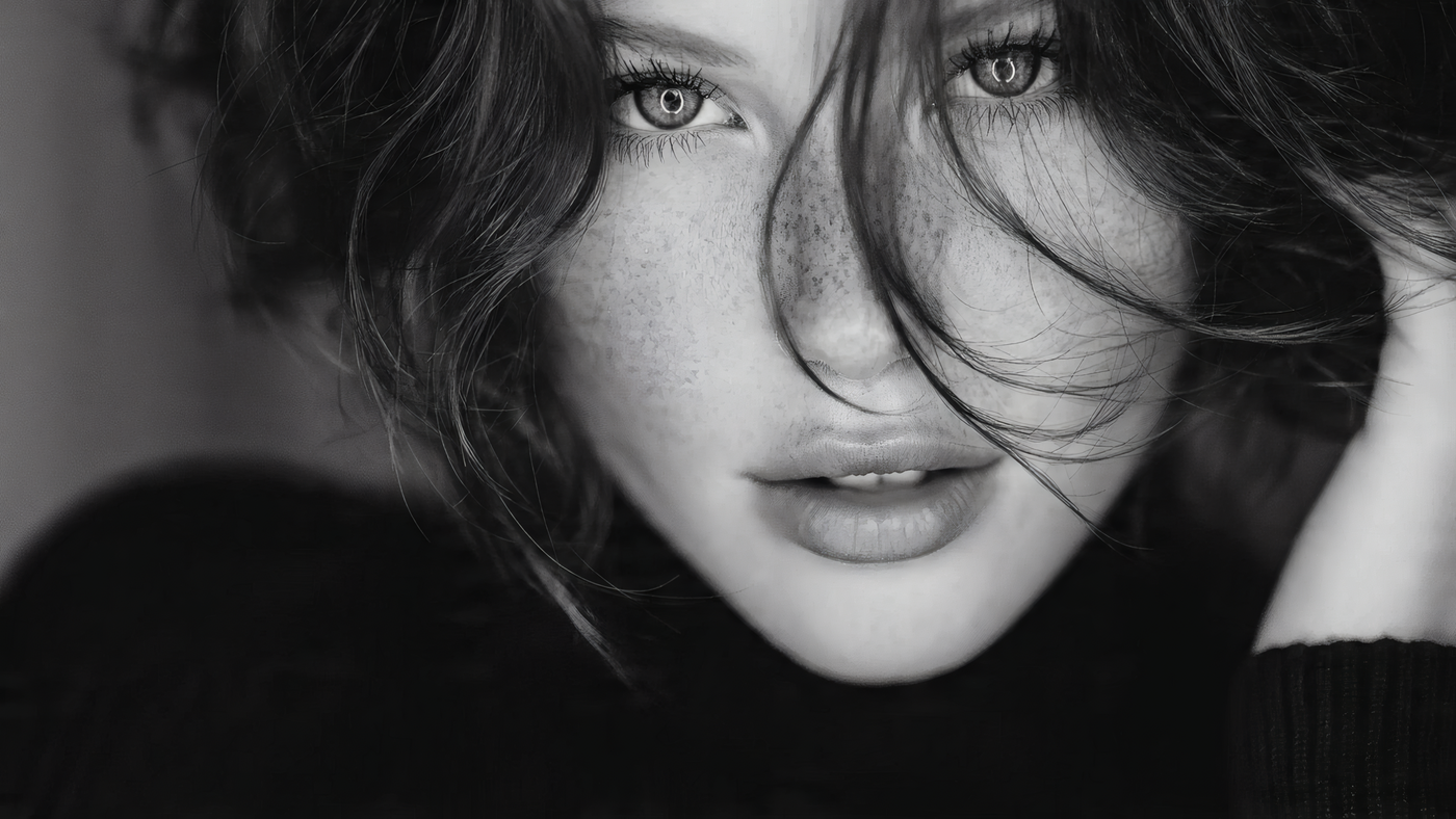 Monochrome Portrait of a Freckled Woman