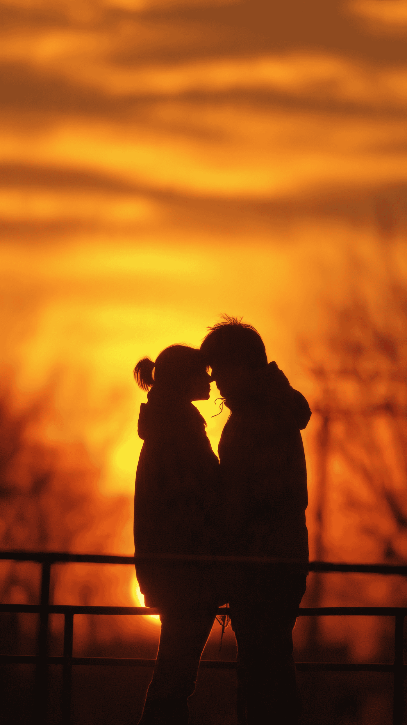 Romantic Couple Silhouette at Sunset