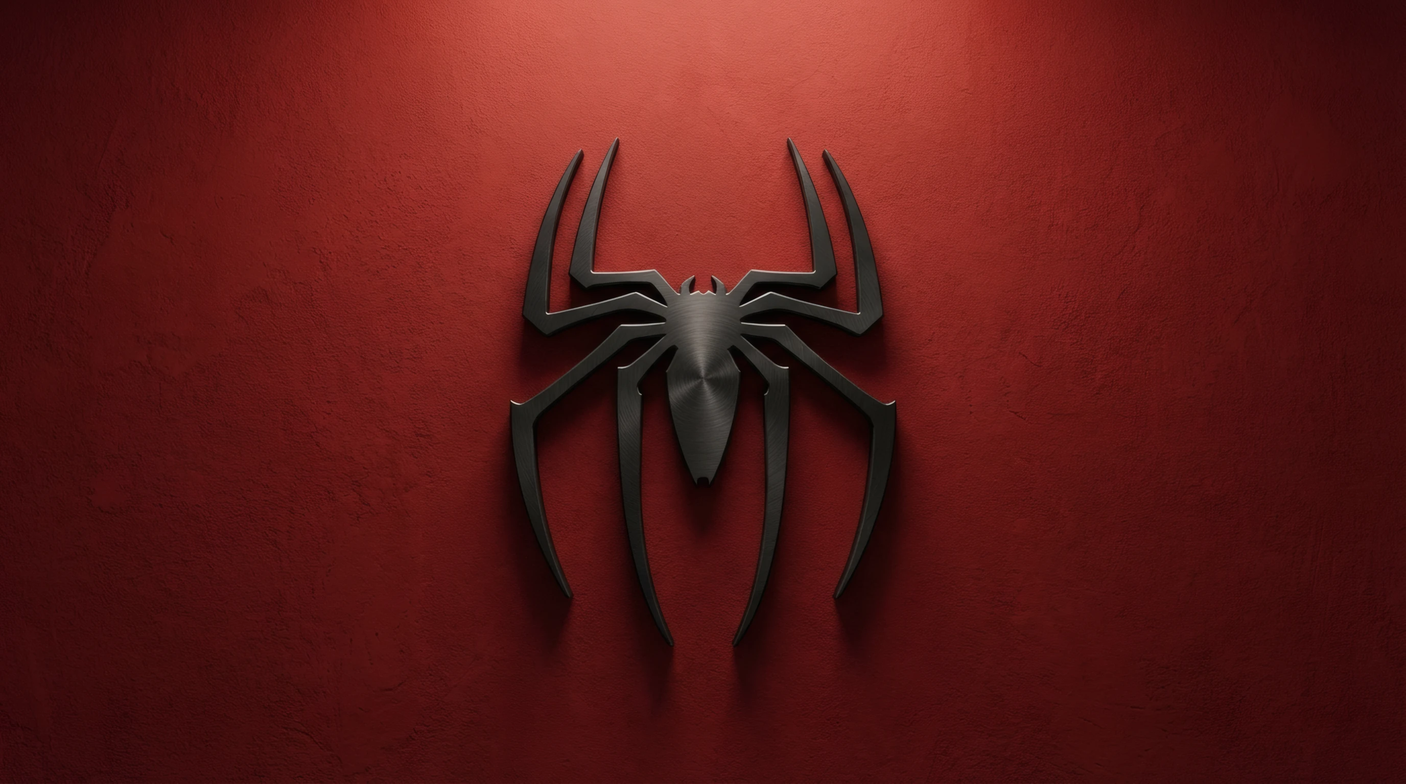 Brushed Metal Spider Emblem on Textured Red