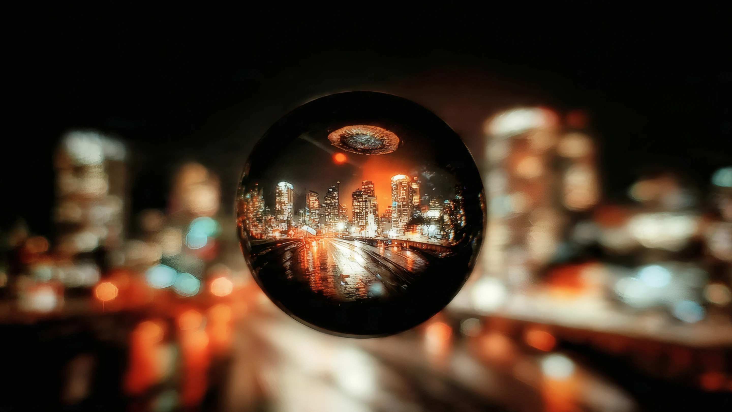 Cityscape Reflected in a Crystal Ball at Night
