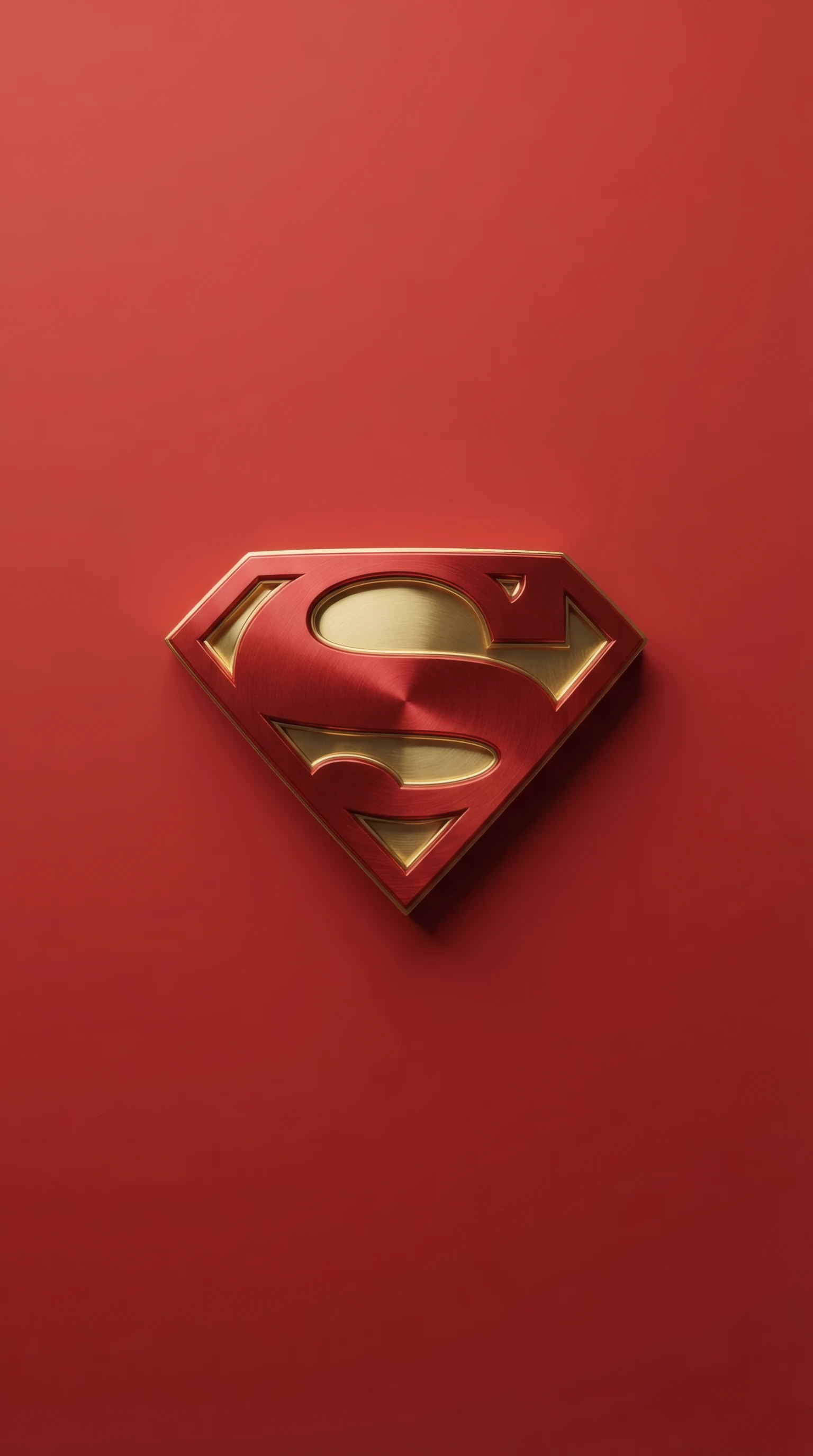 Metallic Superman Logo on Matte Red Surface