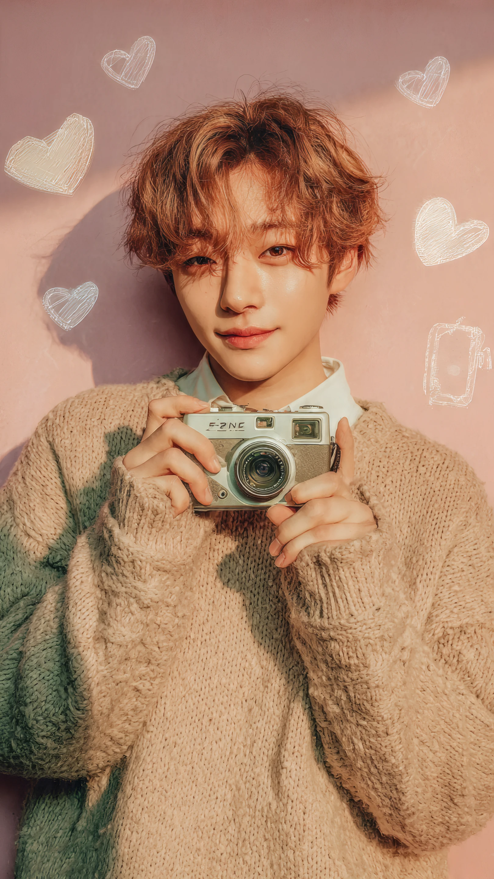 Portrait of a Young Man with Retro Camera and Hearts