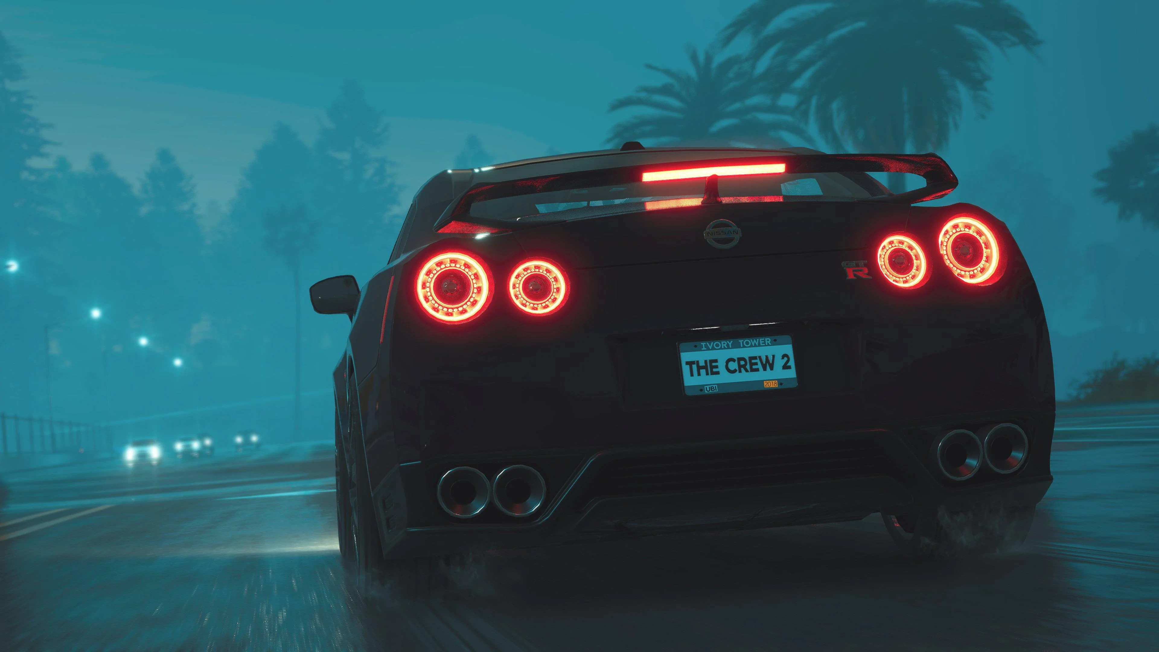 Sleek Black Nissan Gtr Tail Lights in the Misty Night