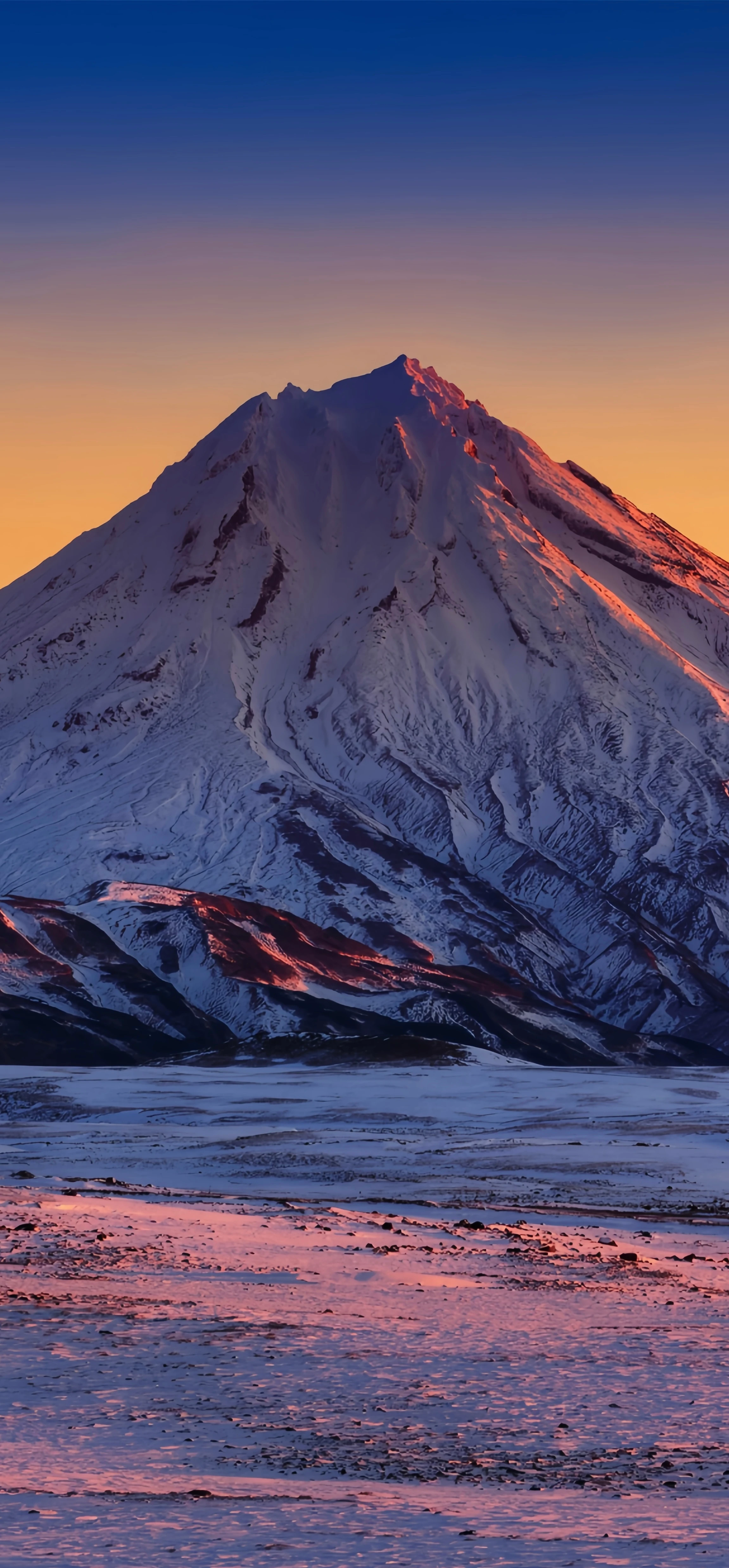 Snow-capped Mountain Peak at Golden Hour