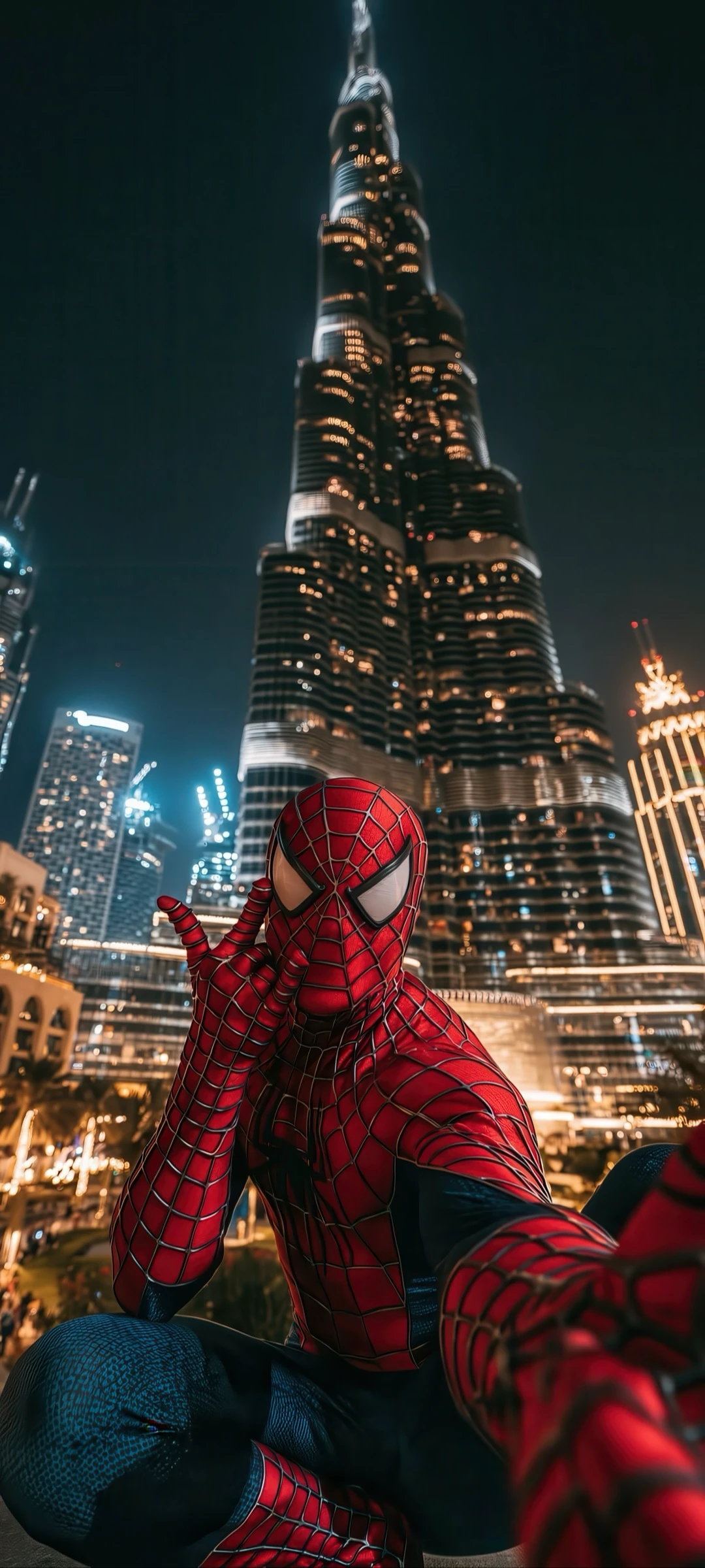 Spider-man Taking a Selfie Atop the Burj Khalifa at Night Spider Man wallpaper 1080x2400