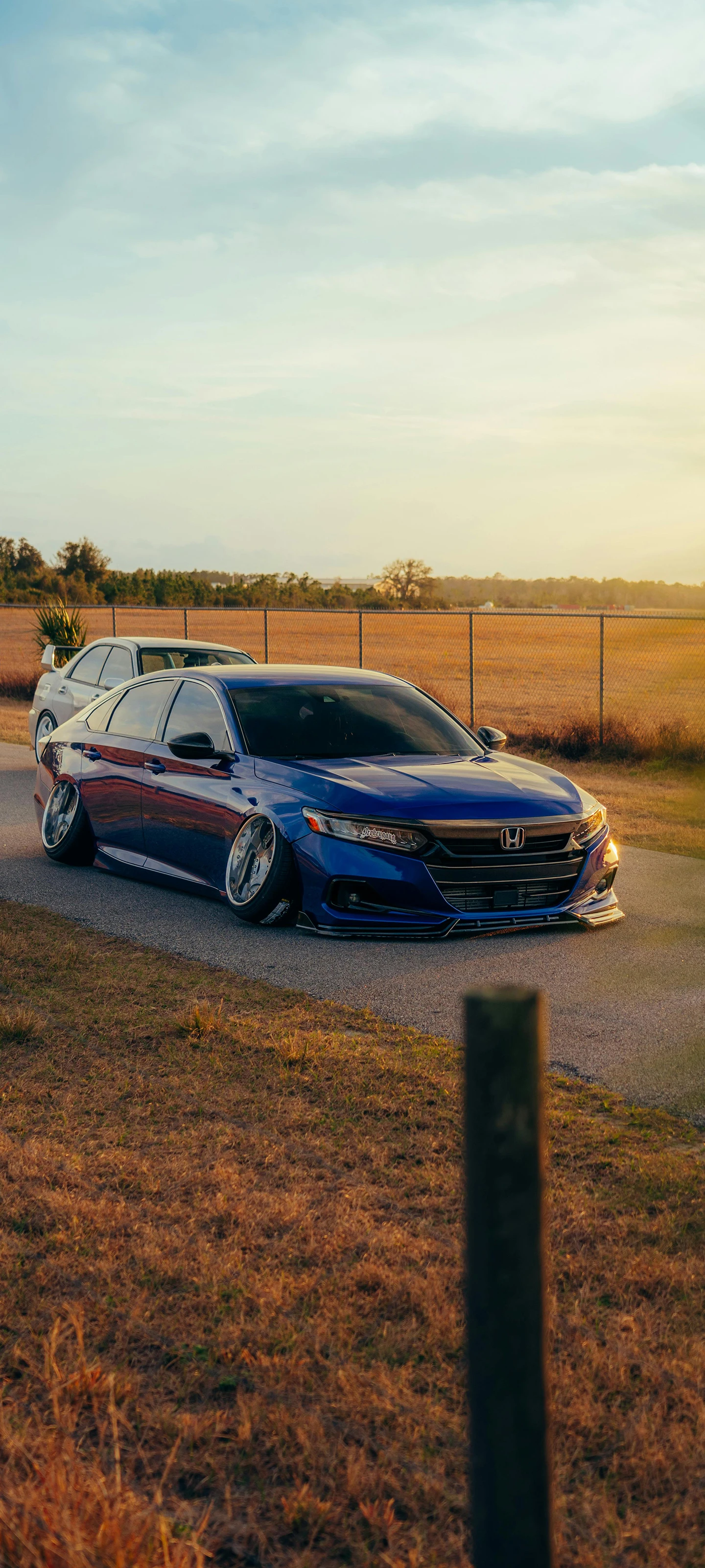 Stanced Blue Honda Accord on Rural Road at Sunset