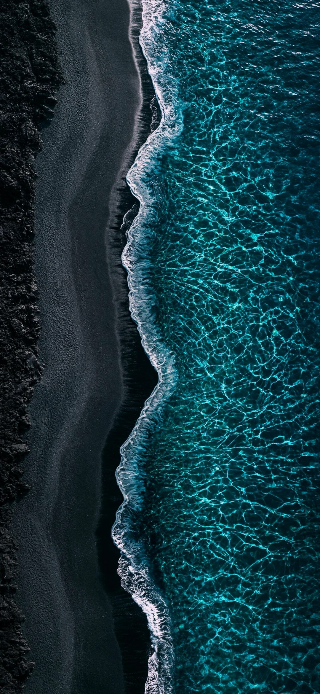 Turquoise Waves Crashing Against Volcanic Black Sand Beach Nature wallpaper 1080x2340